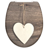 Asiento de inodoro Schütte con duroplast de corazón de madera de cierre suave con estampado
