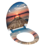 Asiento de inodoro Schütte con cielo de puesta de sol de liberación rápida de cierre suave